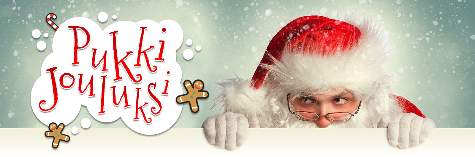 Pukkijouluksi.fi – joulupukki kurkistaa lumisessa bannerissa